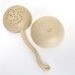 Beautiful tea strainer  with curled grip with a fitting bowl