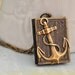 JOURNEY book style antiqued brass locket with anchor