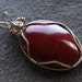 SALE. Red Mountain Jade and Sterling Silver Wire Wrapped Cabachon Pendant. smaller size. Gifts for her under 20.