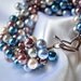 Gorgeous pearl dangle bracelet in blues and wines