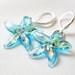 Glass starfish earrings, blue with confetti