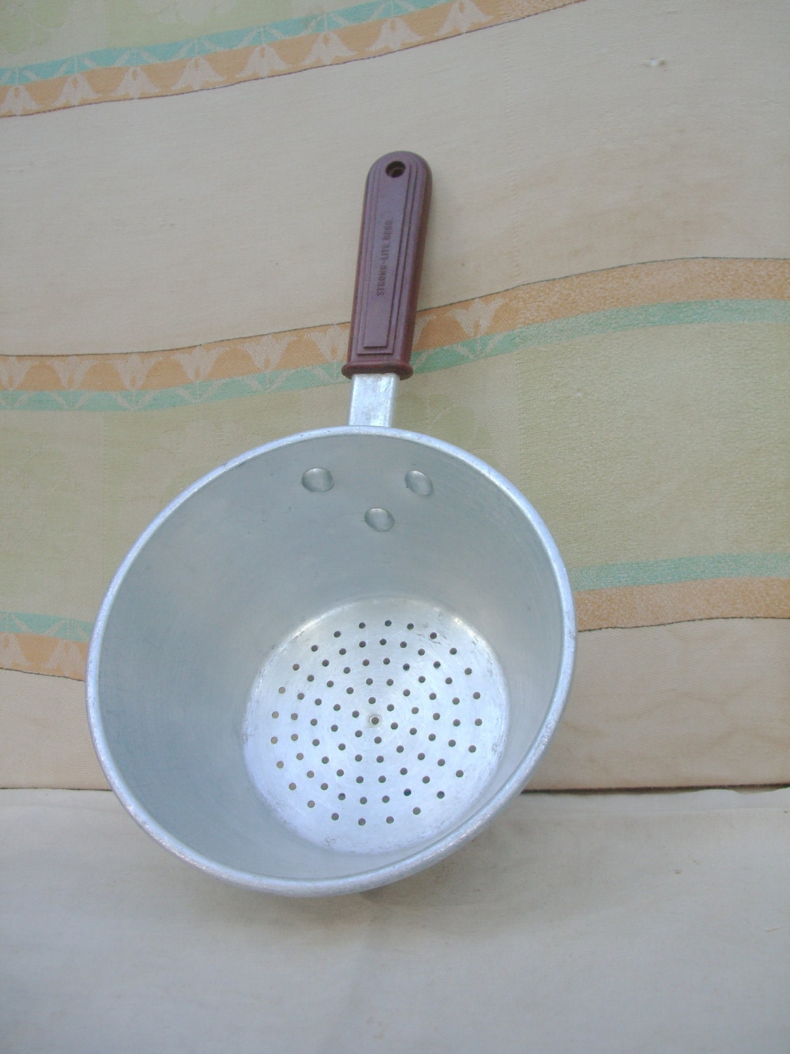 Vintage. Vintage Decor.Vintage Industrial Kitchen. Metal Strainer with Bakelite.1940s