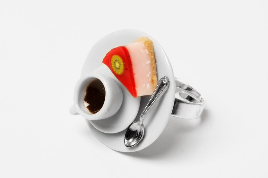 Tropical cheesecake and a cup of coffee ring