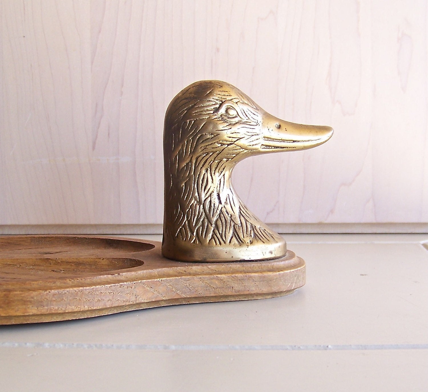 vintage brass duck head wood valet