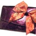 Royal Purple metallic leather beautiful bow clutch bag
