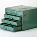 Reserved do not buy Vintage Industrial Green Parts cabinet..