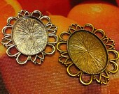 Antique Brass & Antique Silver 40x30mm settings.  10 Piece mixed lot.