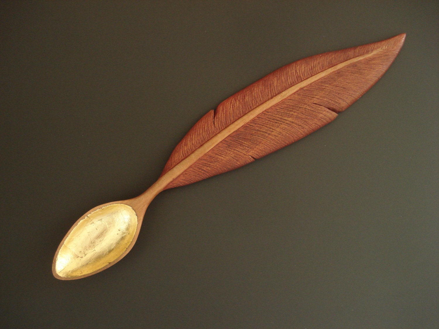 Feather    wood spoon