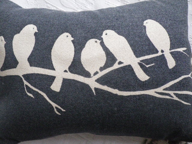 Hand printed midnight blues bird on a branch cushion