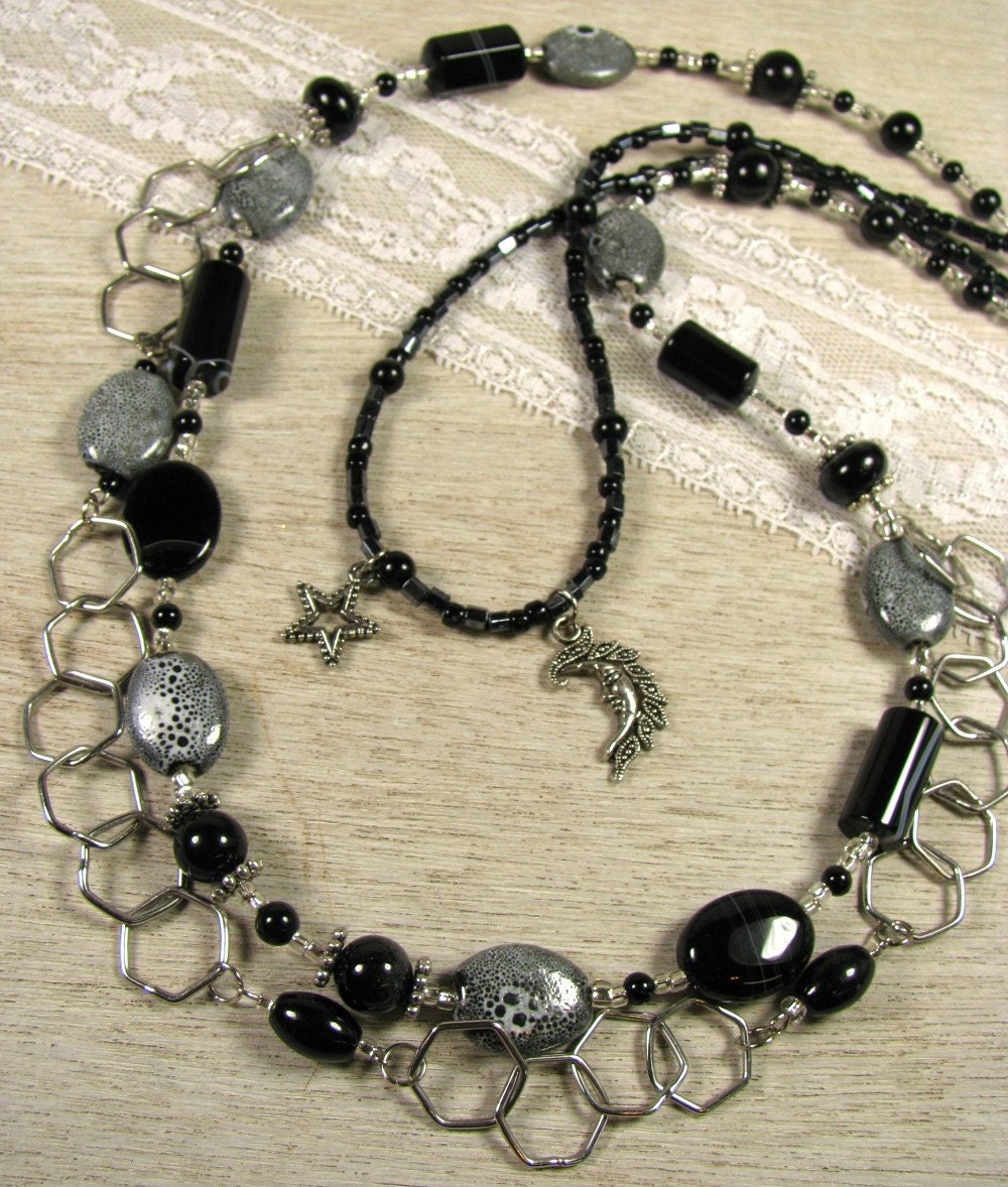 Black and Gray Multi-Strand Necklace with Sun and Star Charms