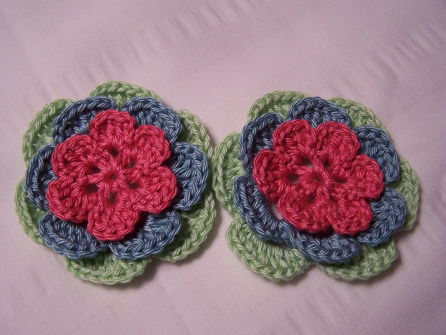 Appliques 2 hand crocheted flowers 2.5 inch embellishment sew on cotton pink blue green