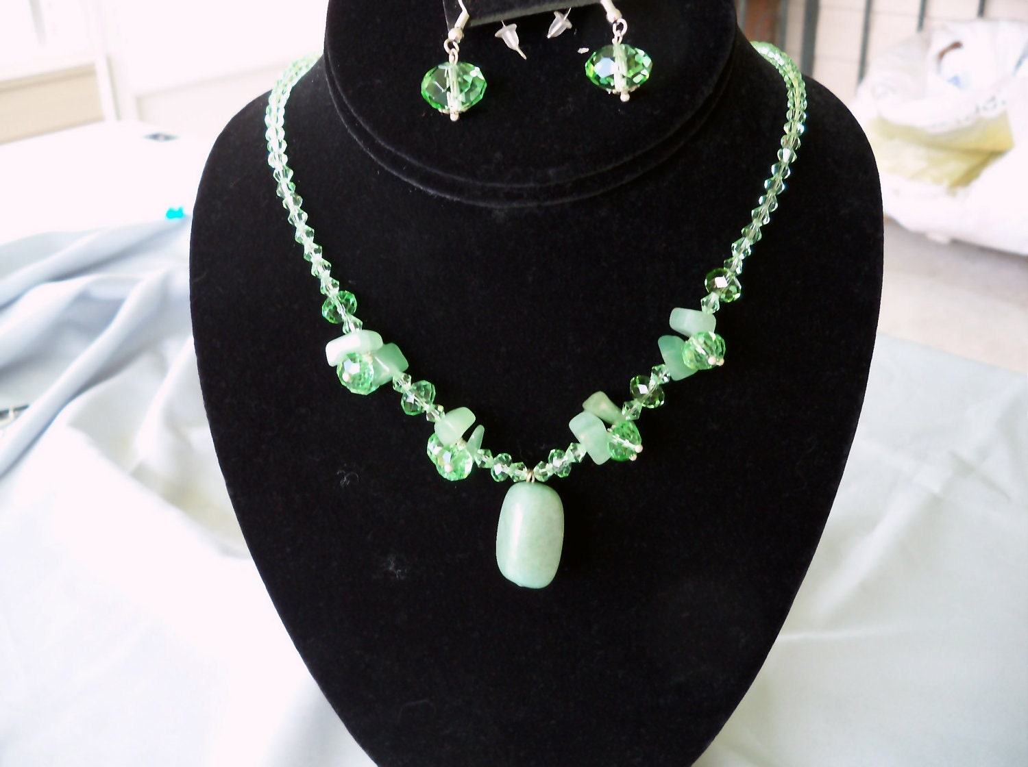 Mint green Jade and Swarovsky crystals necklace and earrings by shoptillyoudropnow on Etsy