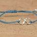 Sterling Silver Karma Infinity bracelet . friendship