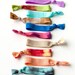 The Half and Half Variety Package - 10 Tie Dye and 10 Solid Hair Ties Made out of Elastic that Double as Bracelets by Mane Message on Etsy