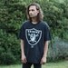 Faded Black Raiders Logo T Shirt - M/L
