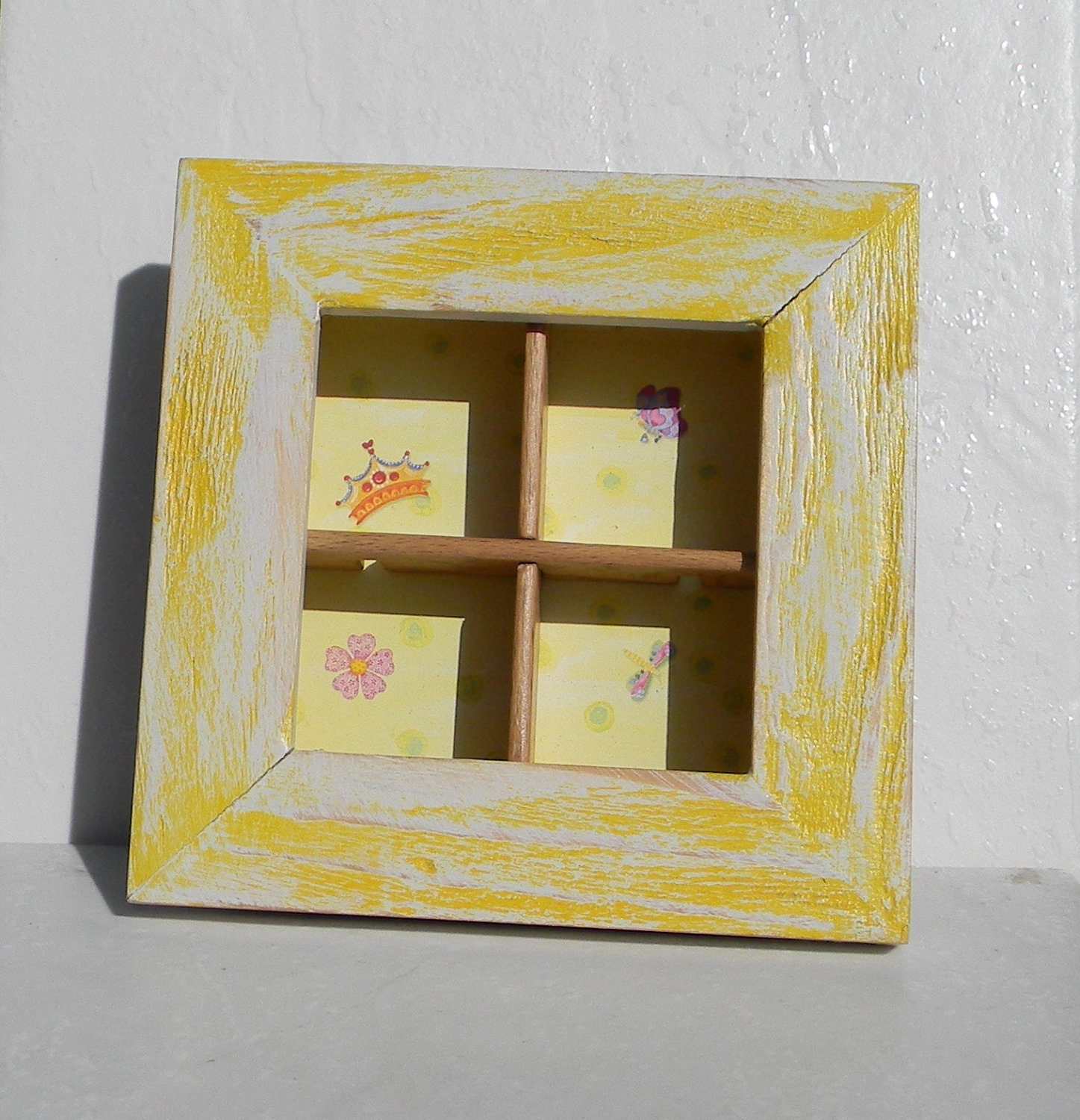 Part printer's type case in a frame, display thimbles, etc.