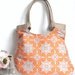 Tile Flourish in tangerine and burlap tote bag