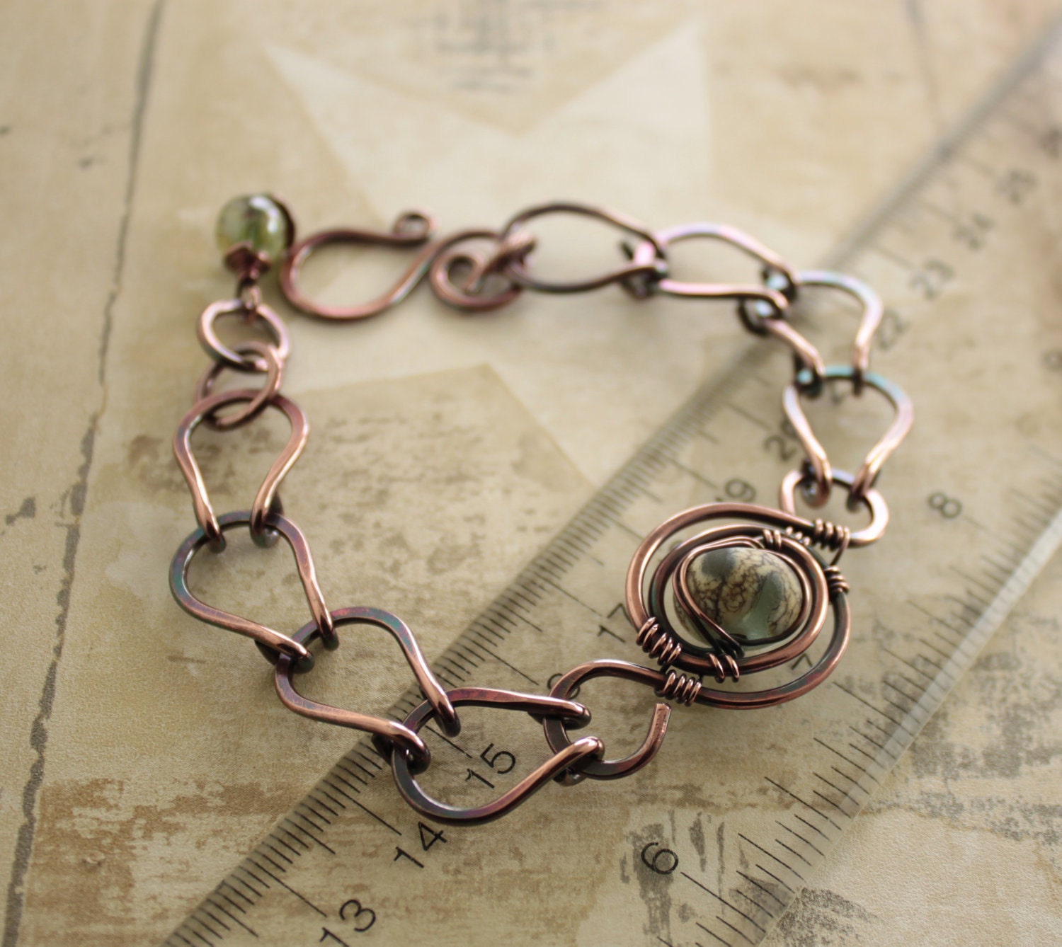 Lampwork copper bracelet with a handmade chain in adjustable length.
