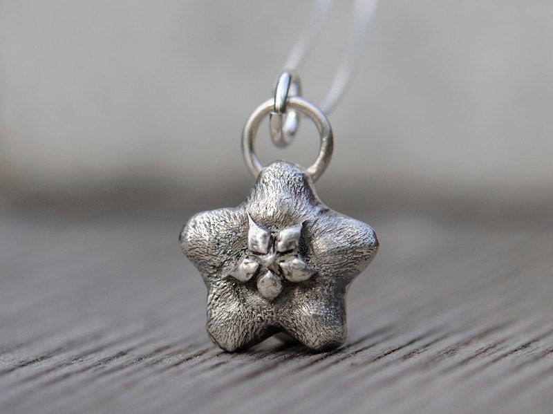 Sterling silver flower necklace. Antiqued wax flower pendant with sterling silver box chain.