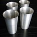 4 Vintage 1950's ALUMINUM TUMBLERS. Mid century modern. Kitsch. Industrial modern.
