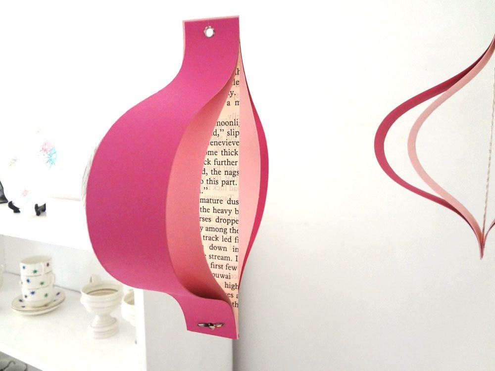 Valentines Day paper decorations, recycled romance novels, retro geometric curves, pink white