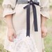 Hankerchief dirndl in grey wool with vintage lace trim