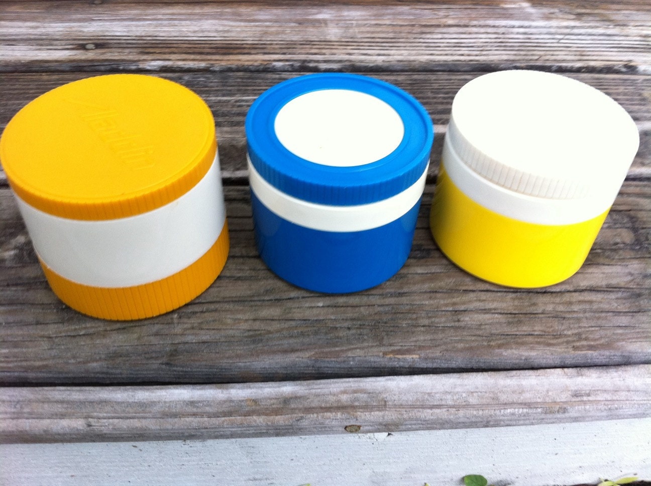 Vintage Thermos and Alladin thermos collection.  Set of 3.  Soup beverage size.  Orange, yellow, and blue.