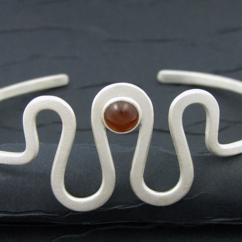 sterling silver curvy cuff bracelet with carnelian cabochon