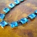 1920s necklace Claw set beautiful pale blue glass faceted square stones Fine metal chain