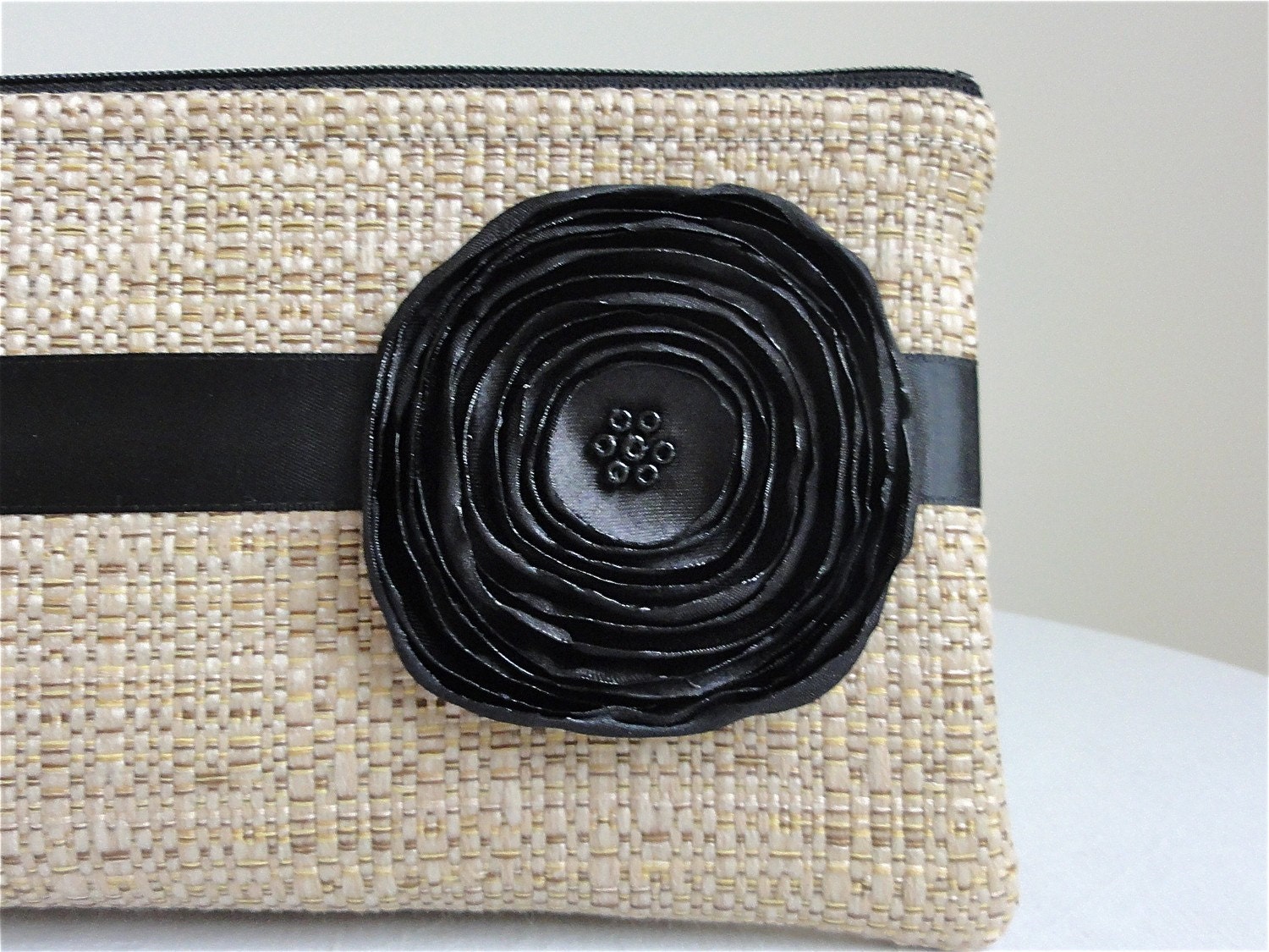 black and tan clutch bag