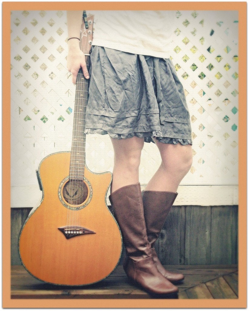 A Girl and Her Guitar