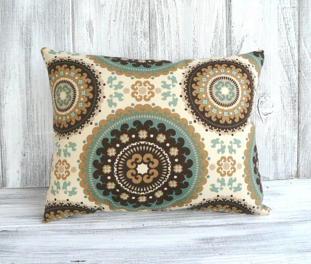 Bohemian throw pillow with ornate circles in brown, green and cream - stuffed designer cushion for home decor