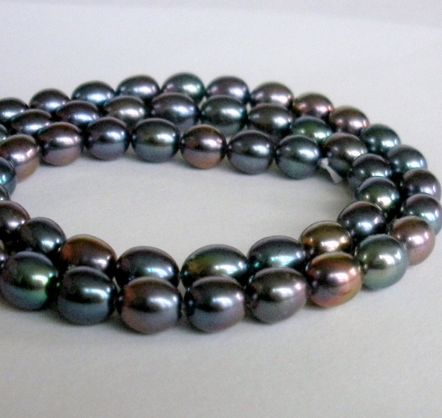 Peacock Freshwater Rice Pearls HALF Strand