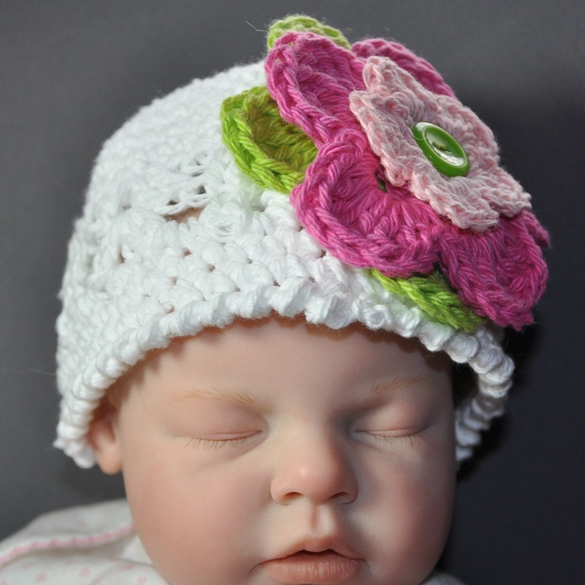 Cotton Baby Hat and Booties in size 6 to 12 months with pink and green flowers