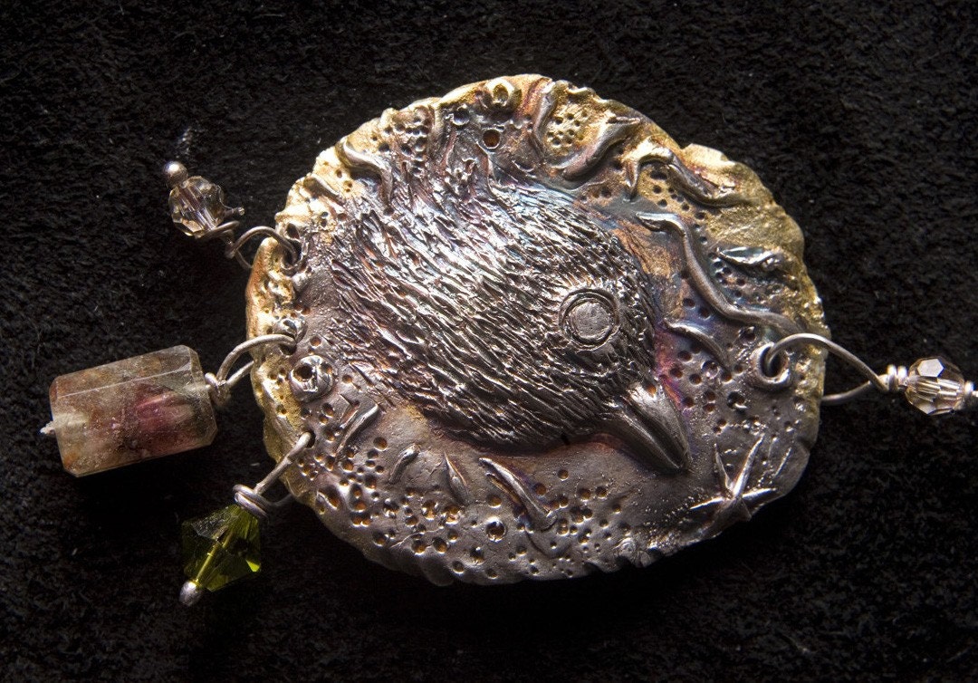 Silver\/gold bird pendant