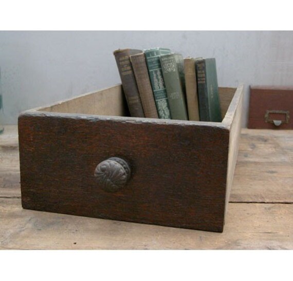 Salvaged old drawer for storage