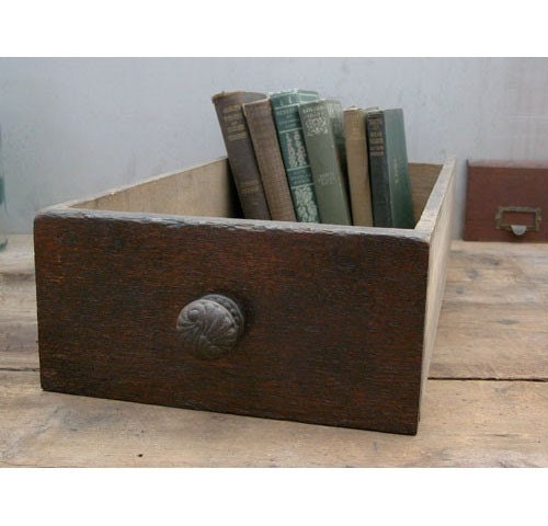 Salvaged old drawer for storage