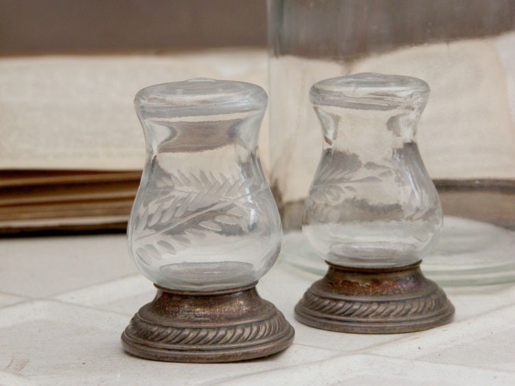 Pair of vintage cut glass and sterling silver salt and pepper shakers