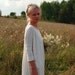 Creamy open-back cotton Milk and honey LeMuse dress with little black bow on the back