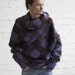 Asymmetric wool sweater