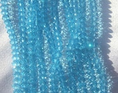 Czech Faceted Rondelles,8mm X 5mm, 8" strand, Aqua Blue