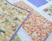 Hummingbirds, Butterflies, Lily Pads, and Flowers adorn this Summer-time Quilt