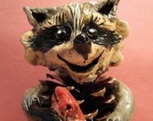 Mama Pine Cone Raccoon and Her Salmon