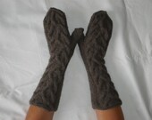 Hand-knitted women light brown gloves with cables