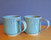 mug with scrolls in twilight sky