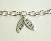 The Hunger Games inspired real not real charm