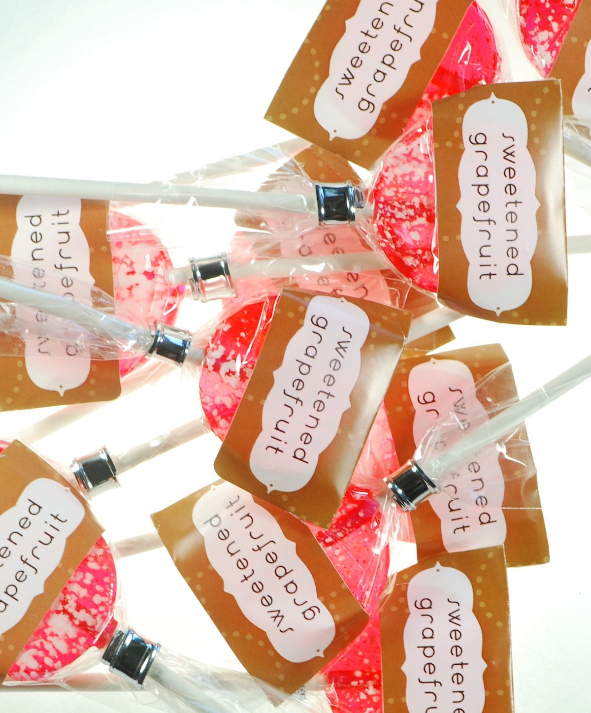 12 Sweetened Grapefruit Lollipops - Natural Flavor - hand poured, hard candy suckers in citrus pink