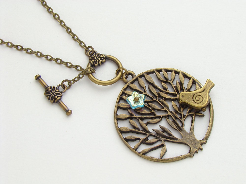 Antiqued gold brass bird birdie on tree of life branch necklace blue glass flower pendant jewelry design by Steampunk Nation R1062