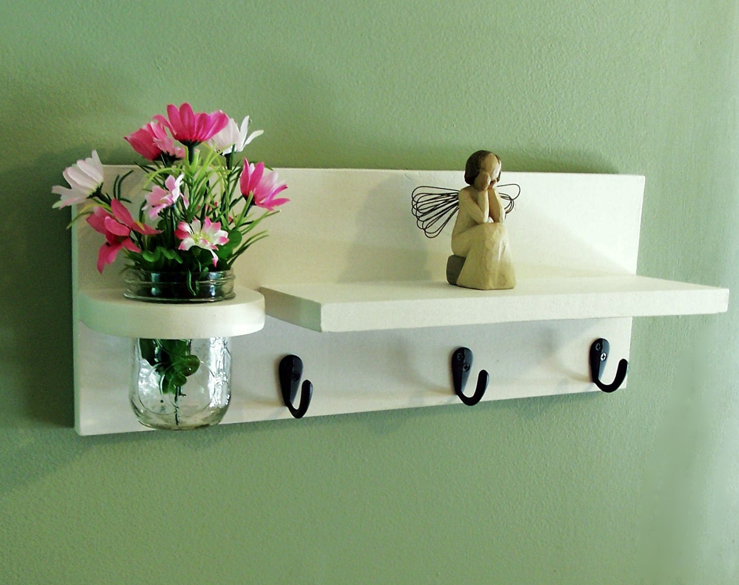 Shelf with jar vase and key hooks