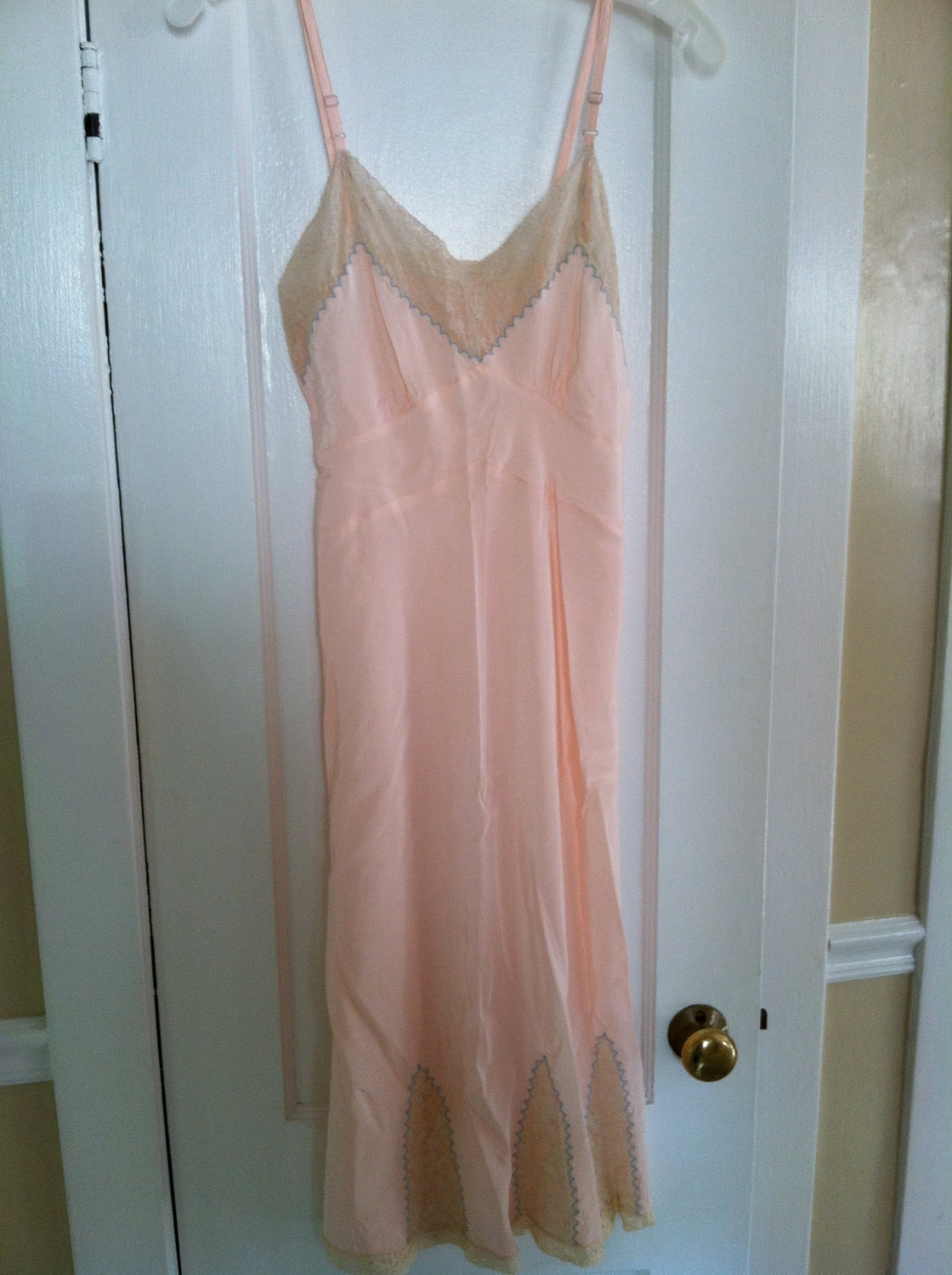 Glamorous Vintage 1940s pink slip with blue trim